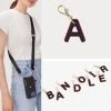 Bandolier Plain Leather Logo Tech Accessories For Women Red/gold X One Size